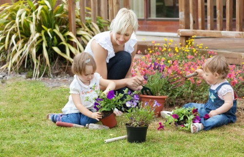 Man and van removing green waste from a suburban garden